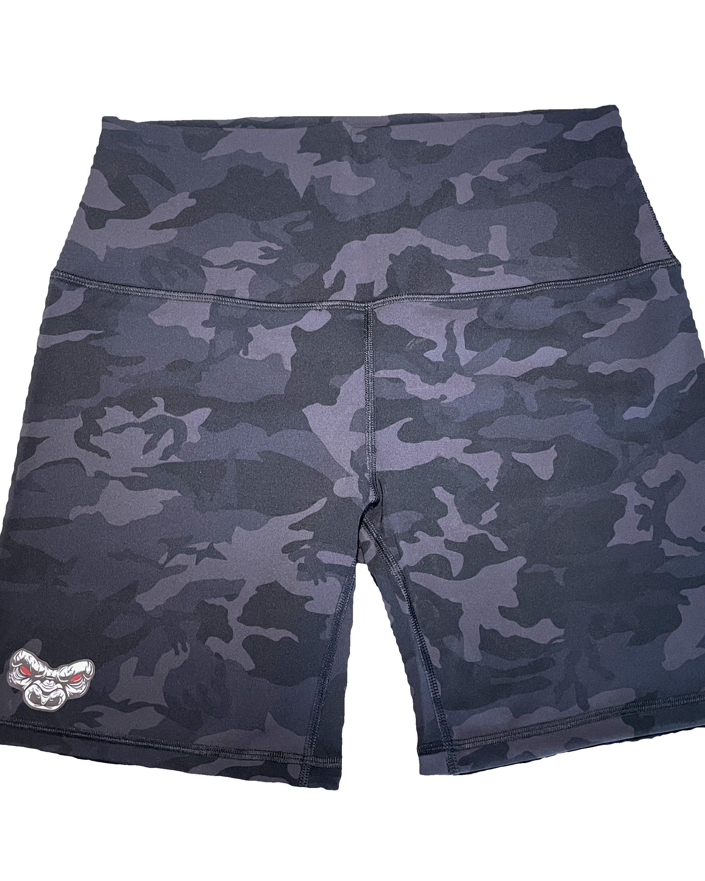 Camouflage-patterned biker shorts on a white background