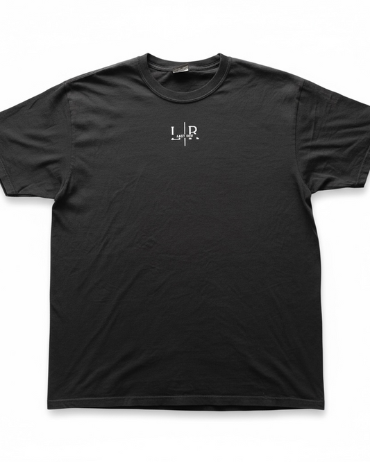 Black t-shirt with a logo on the chest against a white background