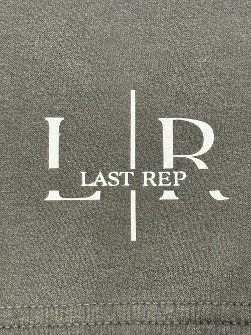 Gray fabric with 'LR Last Rep' logo printed on it