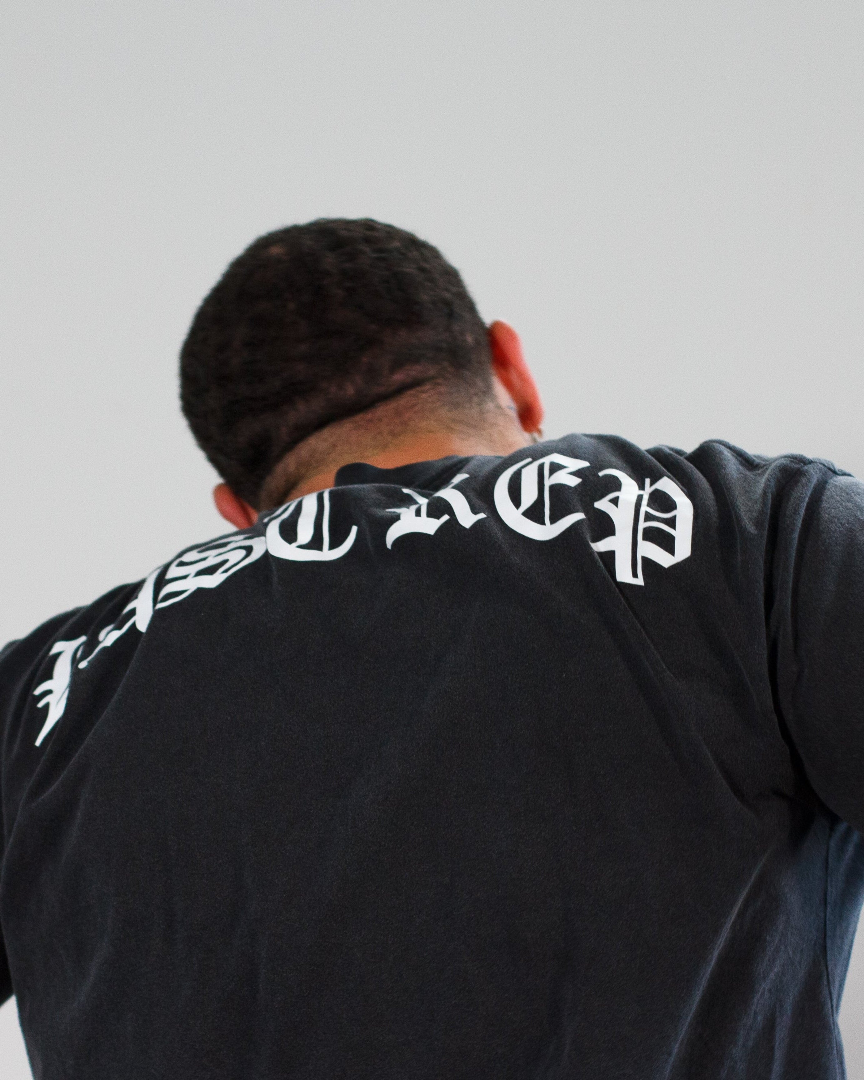 man dancing with last rep gym clothes